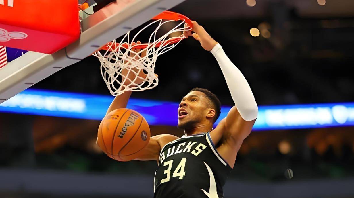 「字母哥独揽40分，雄鹿力克热火保住榜首」